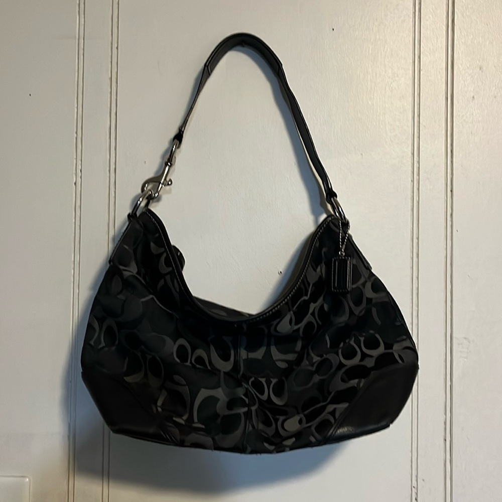 Vintage Coach shoulder bag. Interior is clean with no signs of wear.